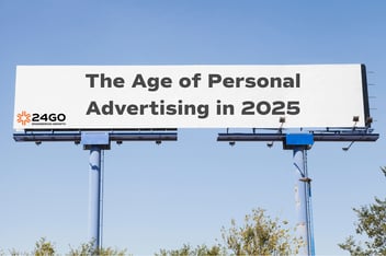 A billboard with the text 'The Age of Personal Advertising in 2025' with 24GO's logo on the bottom left